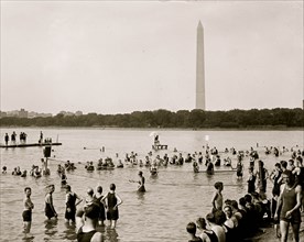 Water Tennis played by citizens in Wasington, DC as they enjpy the tidal basin 1921