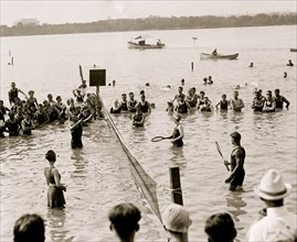 Water Tennis played by citizens in Wasington, DC as they enjpy the tidal basin 1921