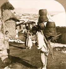 Peddlers Sell Pottery in Korea 1906