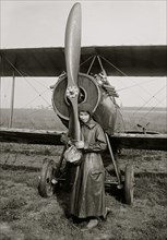 Woman hugs Plane Propeller