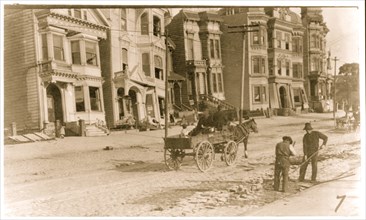 Workers with a cart clearing rubble after the San Francisco Earthquake 1906