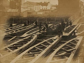 Yard at Alexandria, construction corps finishing portable bridge trusses 1863
