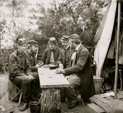 Yorktown, Va., vicinity. Duc de Chartres, Comte de Paris, Prince de Joinville, and friends playing dominoes at a mess table, Camp Winfield Scott 1862