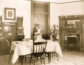 Serving the dinner 1899