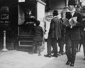 Young Boy Buys a Ticket to the Theatre 1909