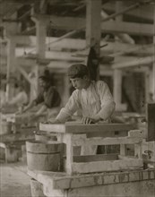 Young boy polishing marble in Vermont Marble Co., 1910