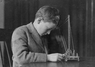 Young Boy with a Mechanical Toy 1924