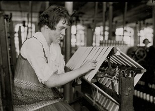 Young Girl woks on silk thread machine 1924