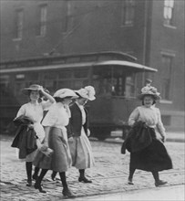 Young girls going home from Brown's Shoe factory (Washington & 18 th Sts.) at close of day 1910