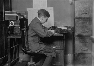 Young office boy, working for J.J. O'Brien and Sons 1917