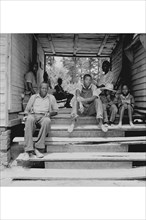 Black Family Sharecroppers on Porch 1939