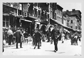Street Level View of People Walking on Hester Street 1890