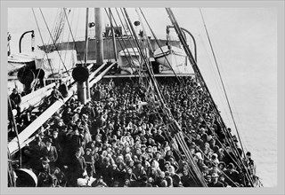 Crowd of Immigrants Standing on Deck 1900