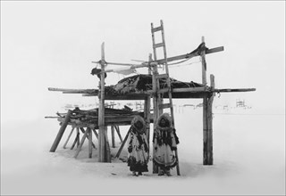 Eskimo Women and Storage Place 1916