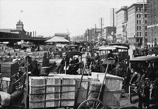 Unloading at the Docks Near West Street, New York City 1899