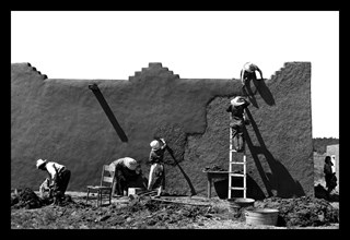Spanish-American Women Replastering an Adobe House 1940