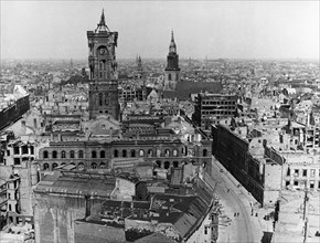 Berlin's red city hall, foreground, left, showing severe bomb damage, berlin in ruins at the end of world war ll, germany, 1945.