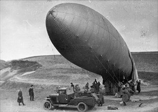 World war 2, soviet soldiers preparing to deploy a barrage balloon in poland, 1945.