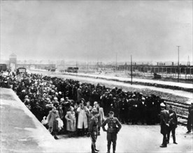 Auschwitz, poland, victims of the auschwitz concentration camp stand on the platform in birkenau station, awaiting selection for either the gas chambers or forced labor, world war 2.