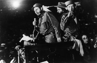 Fidel castro ruz addressing the cuban people in columbia city (later freedom city) after his victory, january 1959, cuban revolution, behind castro, on the right is commander camilo cienfuegos, cuban ...
