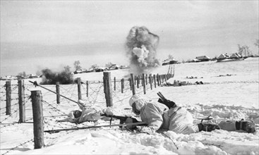 1942: the destruction of an enemy's centre of resistance, sappers cutting barbed wire entanglements to clear the way for the infantry's advance.