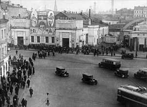 Moscow, 1936,  arbat square with a cinema showing 'lyubov' i nenavist'' (love and hate)  by a, endelstein.