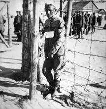 World war 2, a prisoner being forced to stand erect at a concentrtion camp for soviet prisoners of war in the lublin province of poland, the photo was taken by a german soldier.