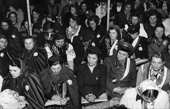 National congress of the league of women held on march 3 & 4, 1951 in warsaw, poland, women participants in a section of the great hall of the polytechnic school during the congress sessions.