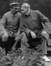 Joseph stalin speaking with playwriter maxim gorky at lenin's tomb in 1931.