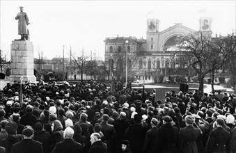 A crowd gathered for the unvailing of a new monument to joseph stalin erected in front of the baltic railway station in leningrad, november 1949.