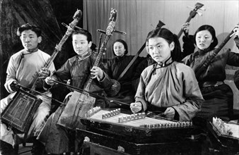 Students at a school of traditional music and drama in ulan bator, mongolia, february 1950, the students learn to play playing horse head fiddles (left) nd other traditional mongolian instruments.