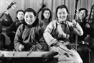 Students at a school of traditional music and drama in ulan bator, mongolia, february 1950, the students learn to play traditional mongolian instruments.