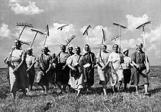 A group of women farmers of the klishevo collective farm replace the men who have left for the front during world war ll, 1940s.