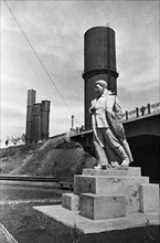A statue of  joseph stalin on the grounds of the mariupol steel mill, ukraine, ussr, 1940.