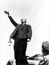Lenin speaking in red square at the unveiling of the temporary memorial to stepan razin, may 1, 1919.