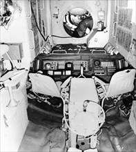 The interior of the salyut 1 space station with the hatchway leading to the soyuz 11 spacecraft, june 1971.