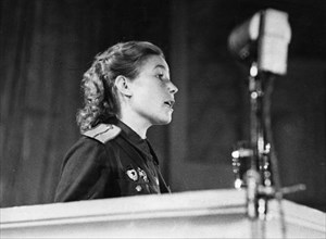 Tank commander, junior lieutenant alexandra boiko, speaking to attendees of the fourth soviet women's anti-fascist meeting on august 20, 1944 at the tchaikovsky concert hall in moscow.