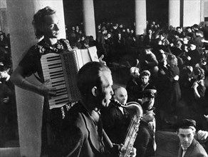 A soviet jazz band performs on a sunday in moscow, 1950s.
