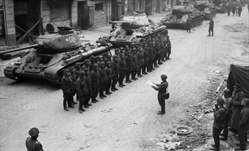 A soviet armored division receiving operational orders prior to the final battle in berlin, germany, march 1945.