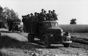 Soviet troops being taken to the firing lines in july 1943, the trucks are american, sent as part of the lend-lease program.