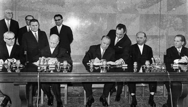 Seated left to right - gdr prime minister willi stoph, political bureau member of the socialist unity party of germany
