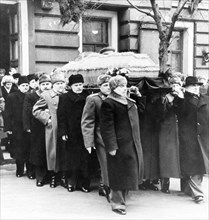 The coffin of stalin is being carried out of the house of trade unions, moscow, march 9, 1953, right to left: l, p, beria (far right), premier g, m, malenkov, general vassily stalin, v, m, molotov, ma...