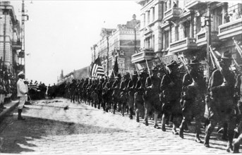 U,s, marines march on svetlansky street in vladivostok in 1918 - 1919 during the time of the war of intervention.