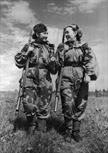 World war 2, volunteer snipers r, skrypnikova (rt) and o, bykova returning from a combat assignment.