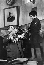 Joseph stalin receiving a bouquet of flowers from engelsina (gelya) markizova, the 7-year-old daughter of the second secretary of the buryat-mongolian regional party committee in 1936, stalin had him ...