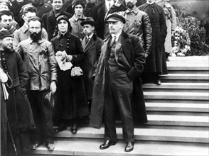 Lenin in moscow's red square attending the may day demonstration in 1919.