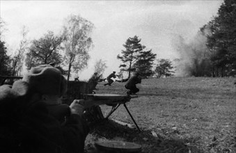 Byelorussian partisans fighting a german punitive detachment, world war 2, january 1944.