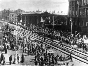 On june 18, 1917, a half million workers and soldiers demonstrated in petrograd's ( st, petersburg ) streets for land, bread, and peace.