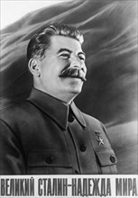 A soviet propaganda poster featuring joseph stalin published by the iskusstvo publishing house, 1950 (?), 'the great stalin - the hope for peace', published during the collection of signatures under t...
