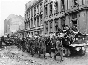 A column of german pow's on their way to a gathering depot in berlin, germany at the end of world war 2, 1945.